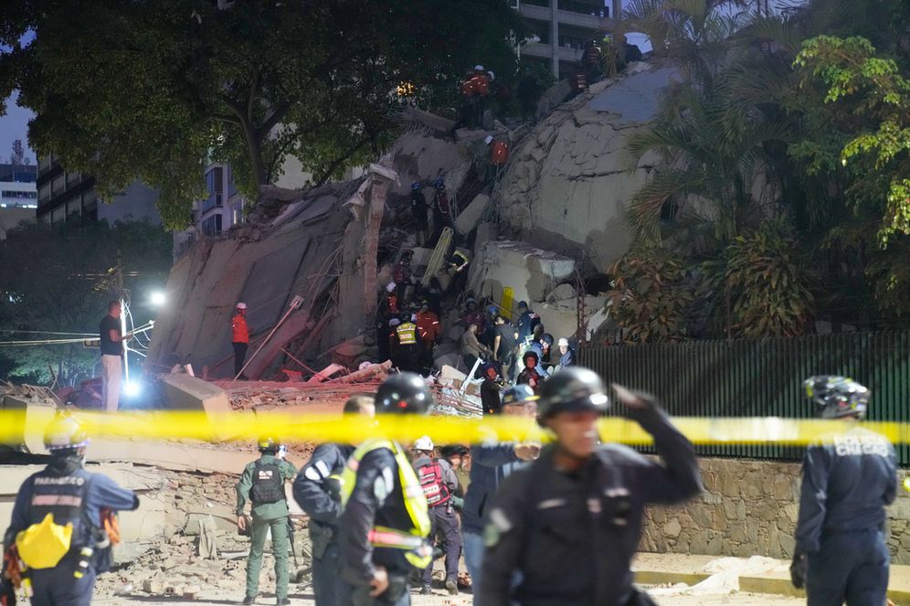 AP Photo/Ariana Cubillos Rescue workers search for survivors at a collapsed building after an earthquake in Caracas, Venezuela, Wednesday, June 24, 2026.