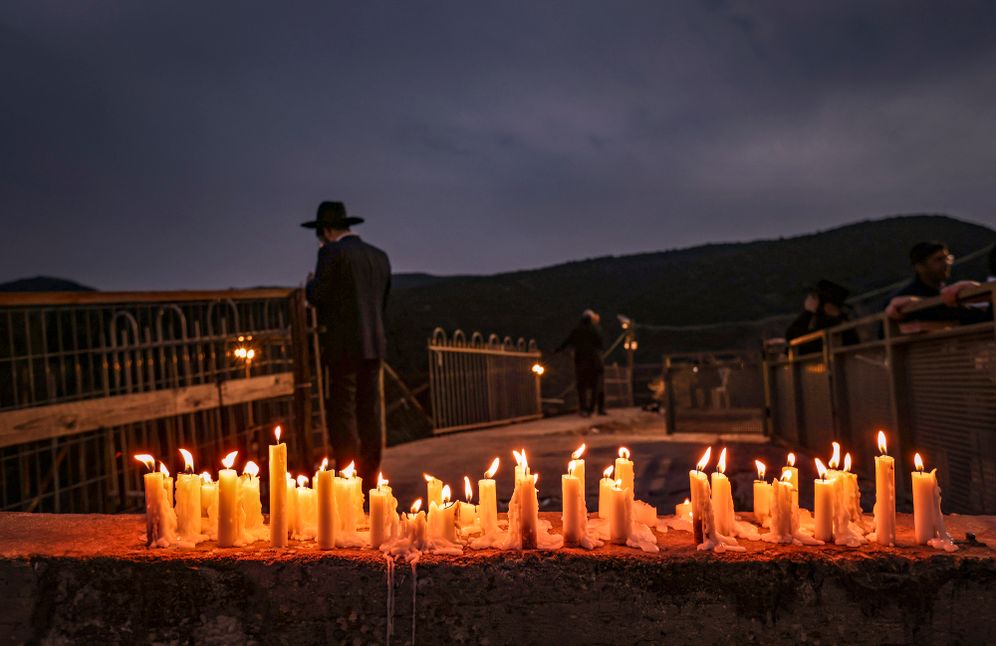 Lighting candles at the site of the disaster, on Mount Meron, archive