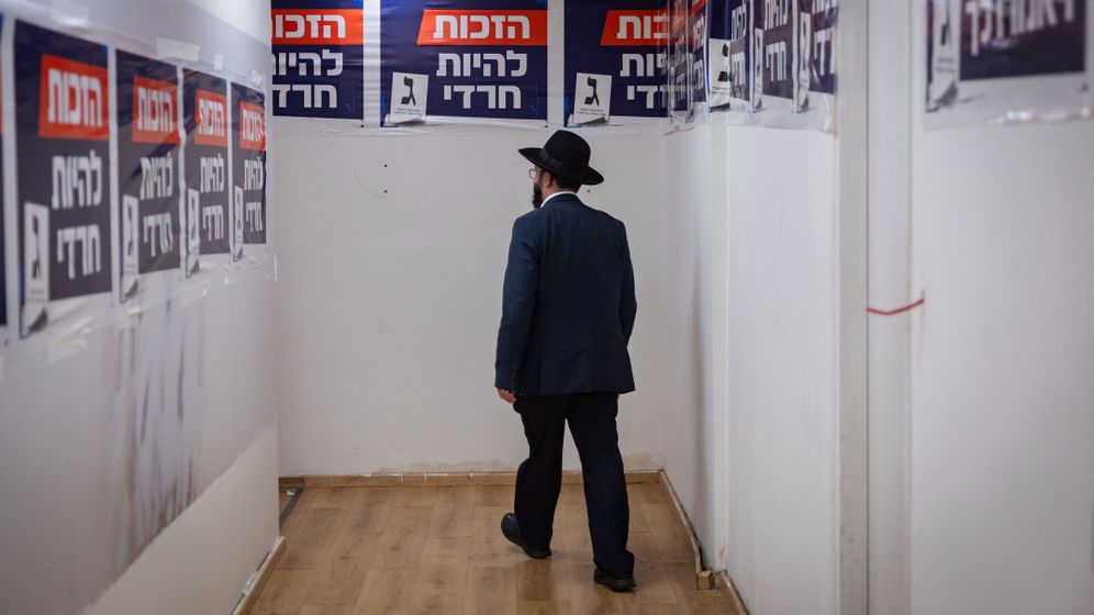 Chaim Goldberg/Flash90 Ultra-Orthodox man attends the opening of the United Torah Judaism party’s election campaign HQ in Jerusalem, October 11, 2026