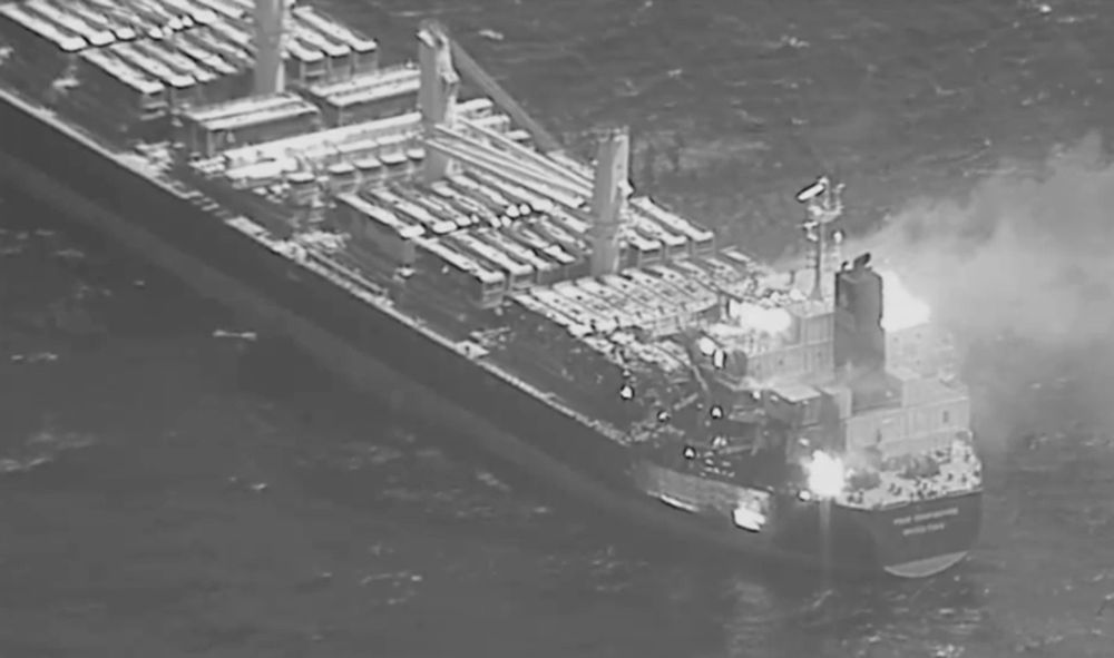 This black-and-white image released by the U.S. military's Central Command shows the fire aboard the bulk carrier True Confidence after a missile attack by Yemen's Houthi terrorists in the Gulf of Aden.