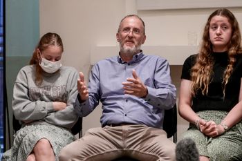 Rabbi Leo Dee (C) and family members at the Rabin Medical Center in Petah Tikva, Israel.