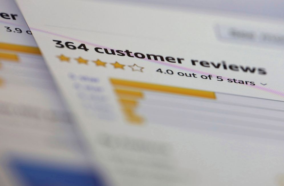 FILE - In this April 17, 2019, file photo, online customer reviews for a product are displayed on a computer in New York. 