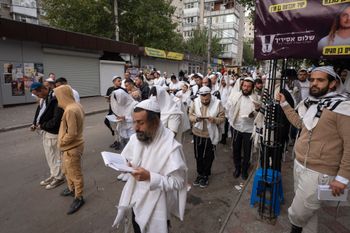 Orthodox Jews pray at the gravestone of Rabbi Nachman, the great grandson of the founder of Hasidic movement, to mark the Jewish new year in the town of Uman, 200 kilometers (125 miles) south of Ukraine's capital Kyiv, Ukraine, Thursday, Oct. 3, 2024. 
