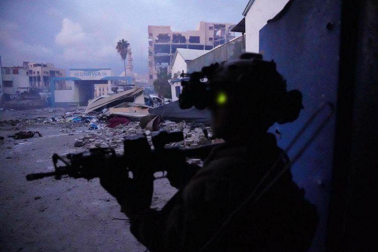 IDF soldier during a raid outside the UNRWA Gaza HQ