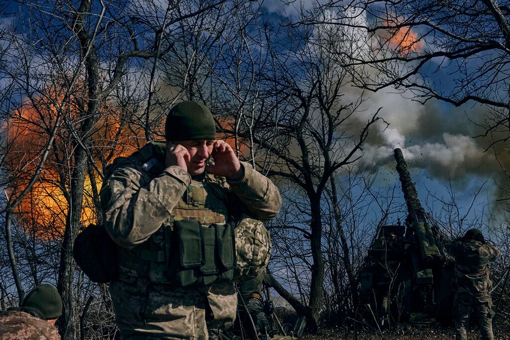 Ukrainian soldiers fire a self-propelled howitzer towards Russian positions near Bakhmut, Donetsk region, Ukraine.