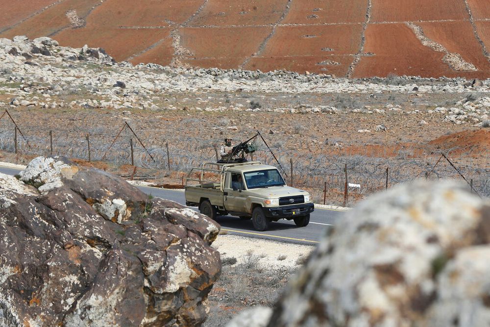 Jordanian soldiers patrol along the eastern border with Syria, in al-Washash, Mafraq governorate, Jordan.