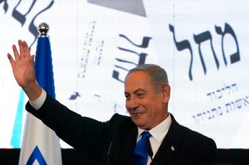 Benjamin Netanyahu, former Israeli prime minister and the head of the Likud party, waves to his supporters after first exit poll results for the Israeli parliamentary election at his party's headquarters in Jerusalem, Israel, November 2, 2022.