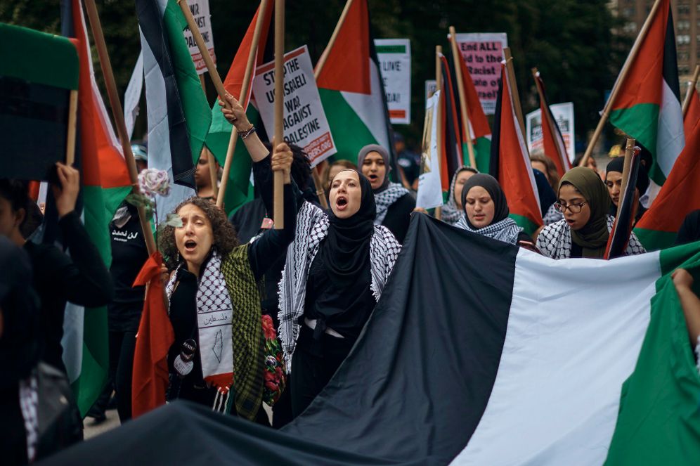 Palestinian supporters shout slogans as they protest against Israel during the annual Celebrate Israel parade, June 3, 2018, in New York.