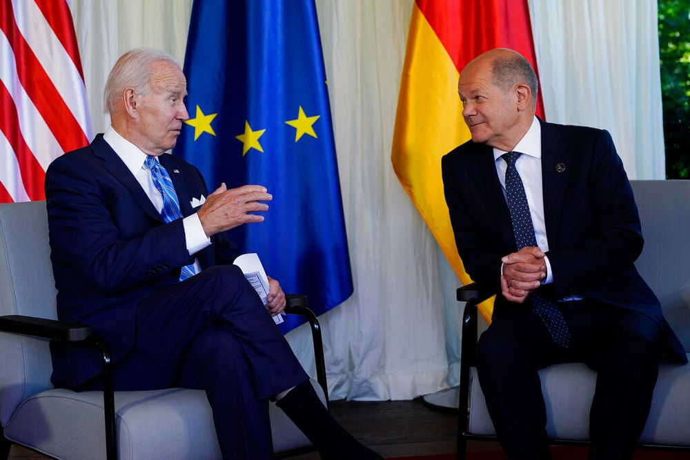 U.S. President Joe Biden (L) and German Chancellor Olaf Scholz speak during a bilateral meeting in Elmau, Germany.