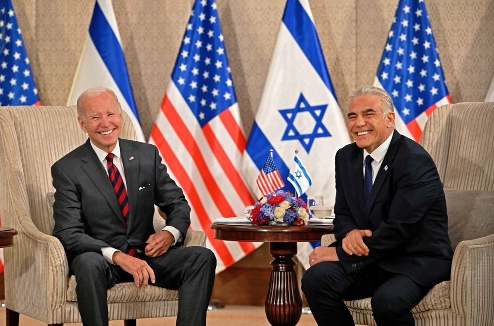 US President Joe Biden (L) holds a bilateral meeting with Israel's Prime Minister Yair Lapid in Jerusalem, on July 14, 2022.