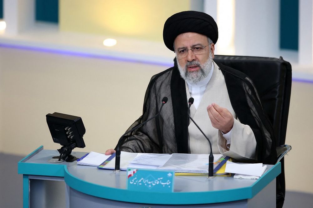 Iranian presidential candidate Ebrahim Raisi during the second televised debate ahead of the June 18 election, at the Iran State television studio, Tehran, June 8, 2021.