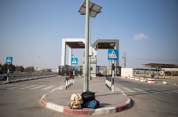 In this Thursday, Aug. 29, 2019, photo, luggage of Palestinian travelers on the ground in from of the main gate of the Rafag border crossing with Egypt, southern Gaza Strip.