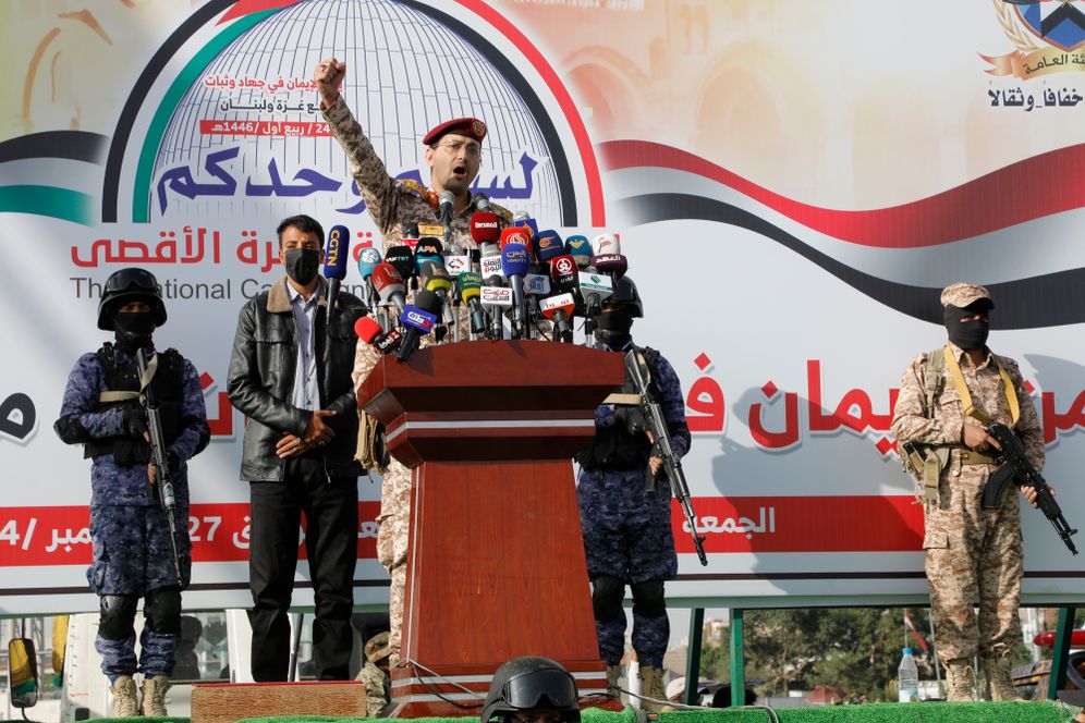 Houthi military spokesman Yahya Saree speaks during a rally against the US and Israel in Sanaa, Yemen