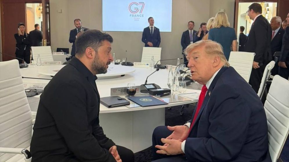 In this photo provided by the Press Service Of The President Of Ukraine, Ukrainian President Volodymyr Zelenskyy, left, and U.S. President Donald Trump speak during a meeting at the G7 summit in Evian-les-Bains, France, Tuesday, June 16, 2026. 
