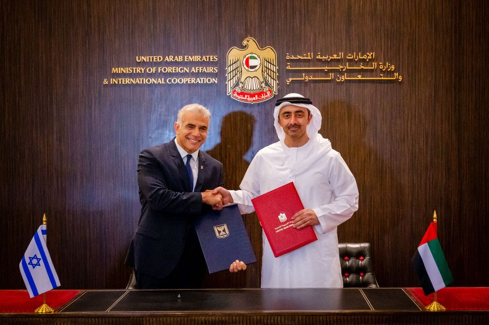 United Arab Emirates Minister of Foreign Affairs and International Co-operation Sheikh Abdullah bin Zayed bin Sultan Al-Nahyan (right) shaking hands with Israel's top diplomat Yair Lapid in Abu Dhabi on June 29, 2021.