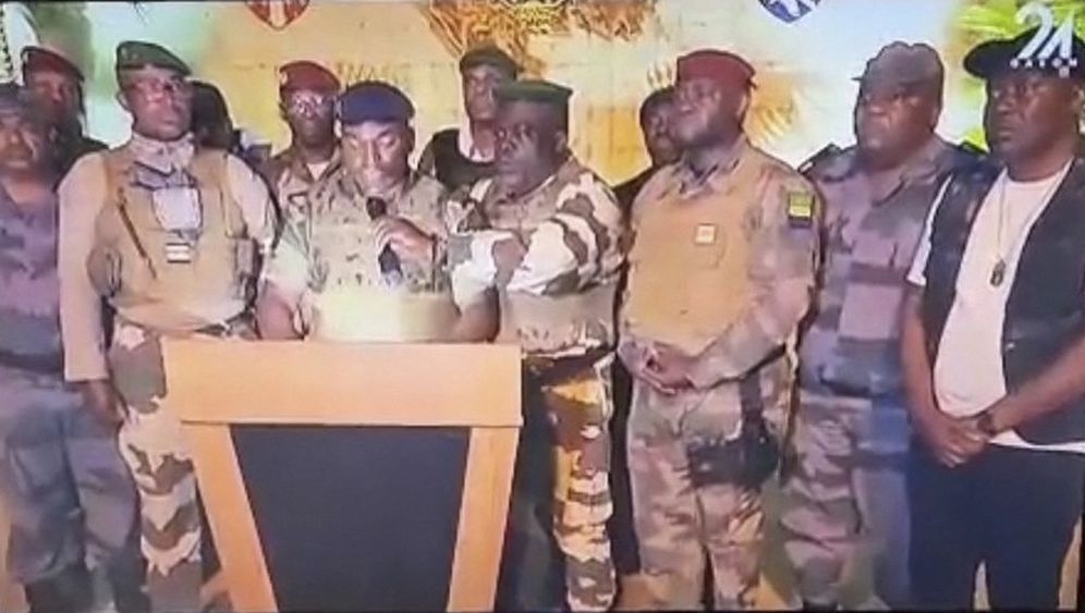 A video grab taken from Gabon 24 showing Gabonese soldiers announcing they were "putting an end to the current regime."