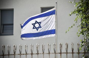An Israeli flag waves at the embassy in Moscow on September 18, 2018.