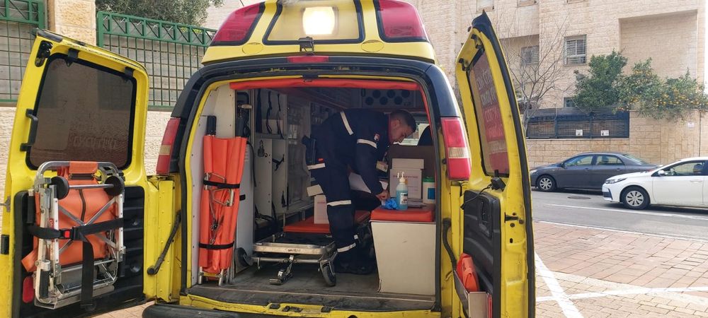 A Magen David Adom paramedic in an ambulance after testing residents in the Israeli city of Modiin for coronavirus, Wednesday, March 18, 2020