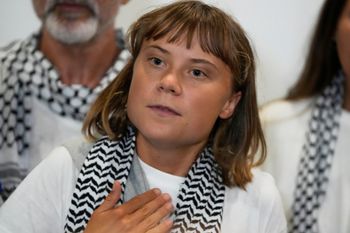 Swedish activist Greta Thunberg speaks as she arrives at the Eleftherios Venizelos International Airport in Athens, Monday, Oct. 6, 2025 after being deported from Israel for taking part in a Gaza-bound aid flotilla. 
