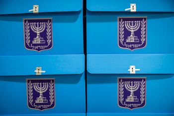Vote Israel Workers prepare ballot boxes for Israel’s upcoming general elections at the Central Elections Committee warehouse in Shoham, ahead of their distribution to polling stations across the country, October 14, 2026. 