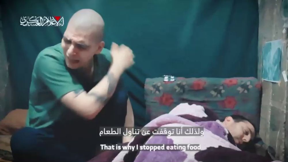 Hostages Yosef-Chaim Ohana and Elkana Bohbot in a Hamas video