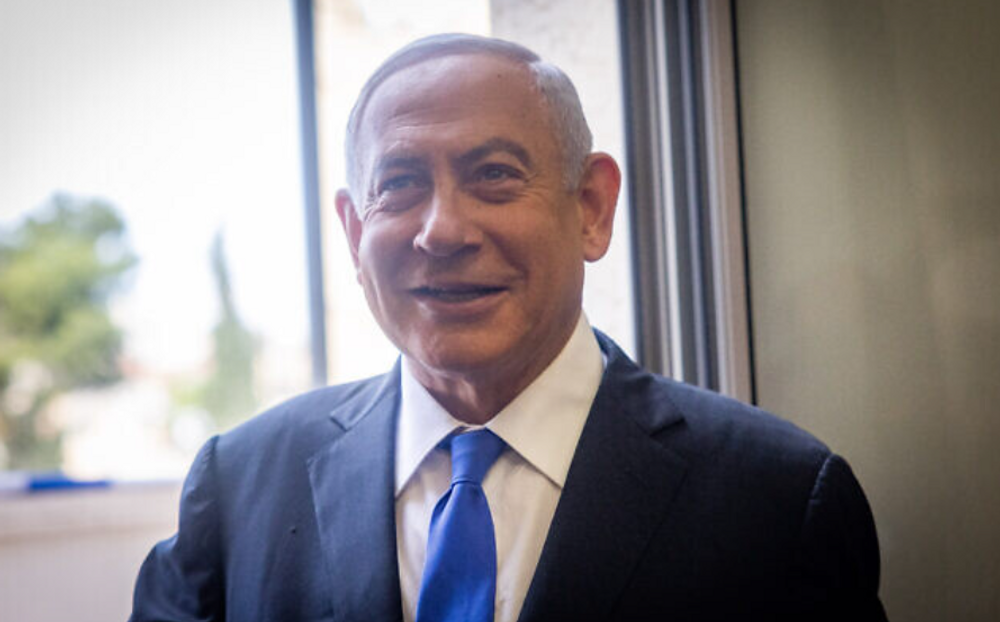 Former Israeli prime minister Benjamin Netanyahu arrives for a hearing in his trial at the Jerusalem District Court on May 11, 2022.