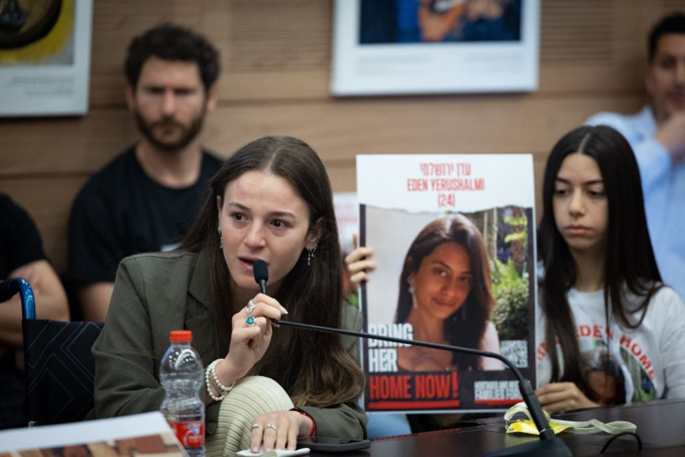 Released hostage Mia Regev Cunio speaks during a status of Women and Gender Equality committee meeting at the Knesset, the Israeli parliament in Jerusalem.