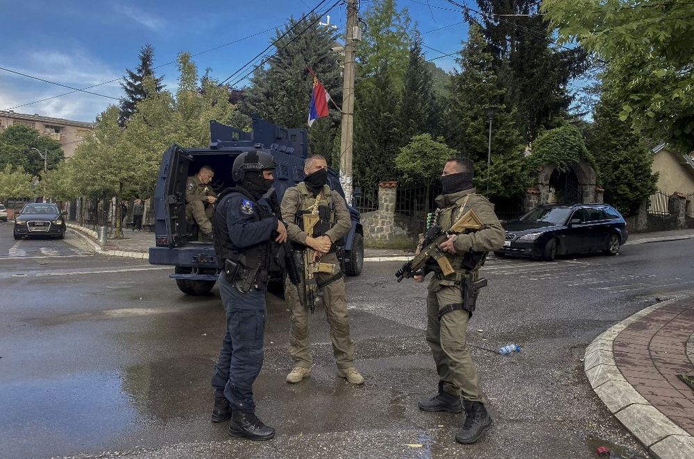 Kosovan police special unit secures an intersection in the town of Zvecan, following clashes between the police and ethnic Serb protesters who tried to prevent a newly-elected ethnic Albanian mayor from entering his office, in Zvecan, northern Kosovo.
