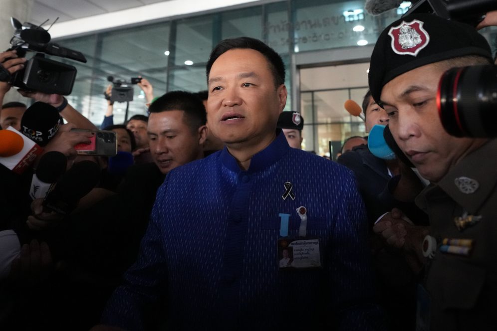 Thailand's newly elected prime minister Anutin Charnvirakul leaves from the parliament in Bangkok, Thailand, Thursday, March 19, 2026. 