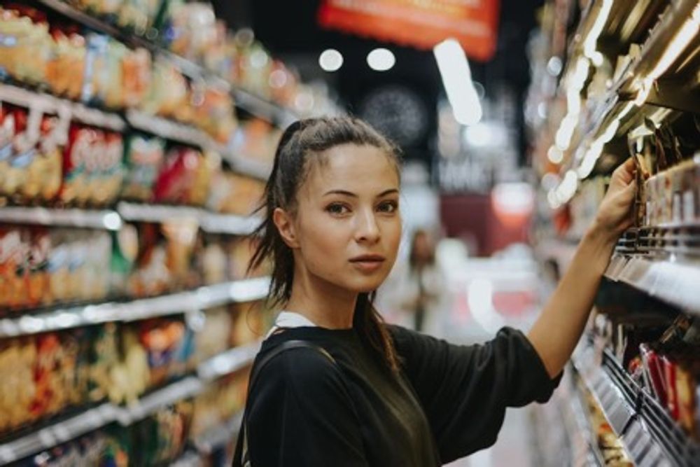 A young woman in a supermarket