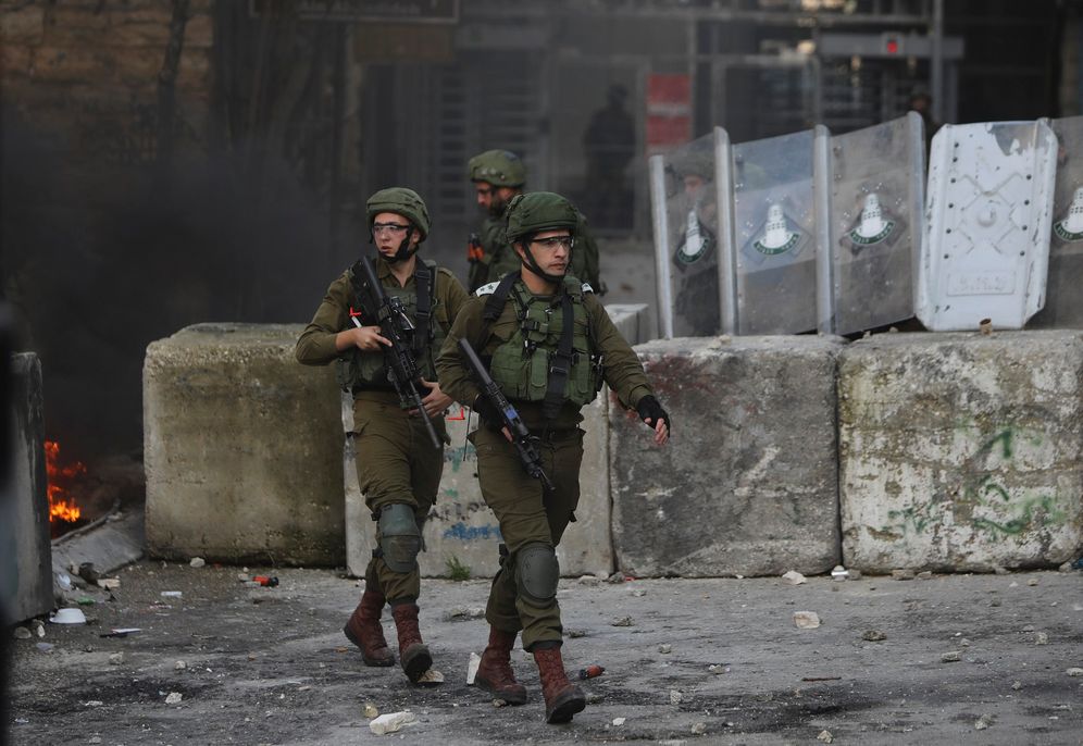 Israeli soldiers deploy during clashes with Palestinians in Hebron, West Bank, on January 30, 2020.