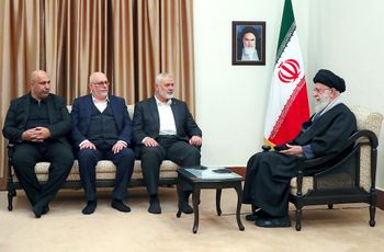 In this photo released by an official website of the office of the Iranian supreme leader, Supreme Leader Ayatollah Ali Khamenei, right, speaks in a meeting with Hamas chief Ismail Haniyeh, second right, and his delegation, in Tehran, Iran.