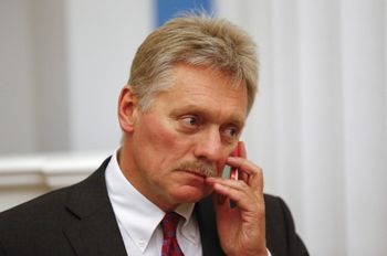 Kremlin spokesman Dmitry Peskov holds a mobile phone before a press conference of Russian President Vladimir Putin and Belarusian President Alexander Lukashenko at the Kremlin in Moscow, Russia, on September 9, 2021.