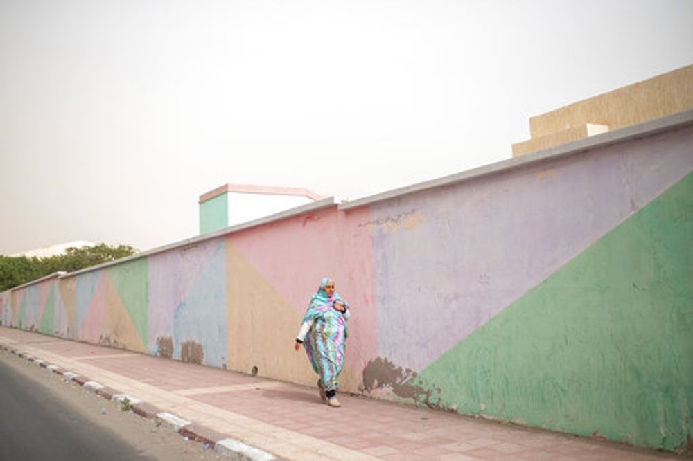 A woman walks in Dakhla city, Western Sahara, on December 21, 2020.