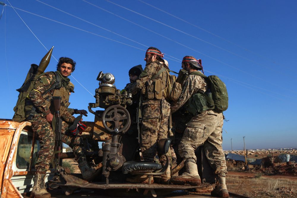 Fighters loyal to the Hayat Tahrir al-Sham Islamist group
