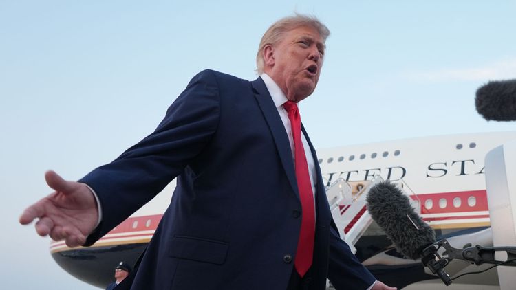 President Donald Trump speaks to reporters as he exits Air Force One at Joint Base Andrews, Md., after attending the World Cup final soccer match, Sunday, July 19, 2026. 
