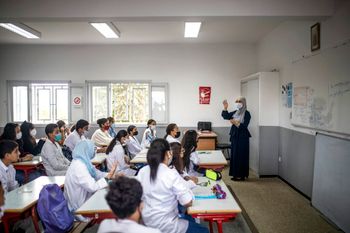 A teacher addresses students in Rabat, Morocco.