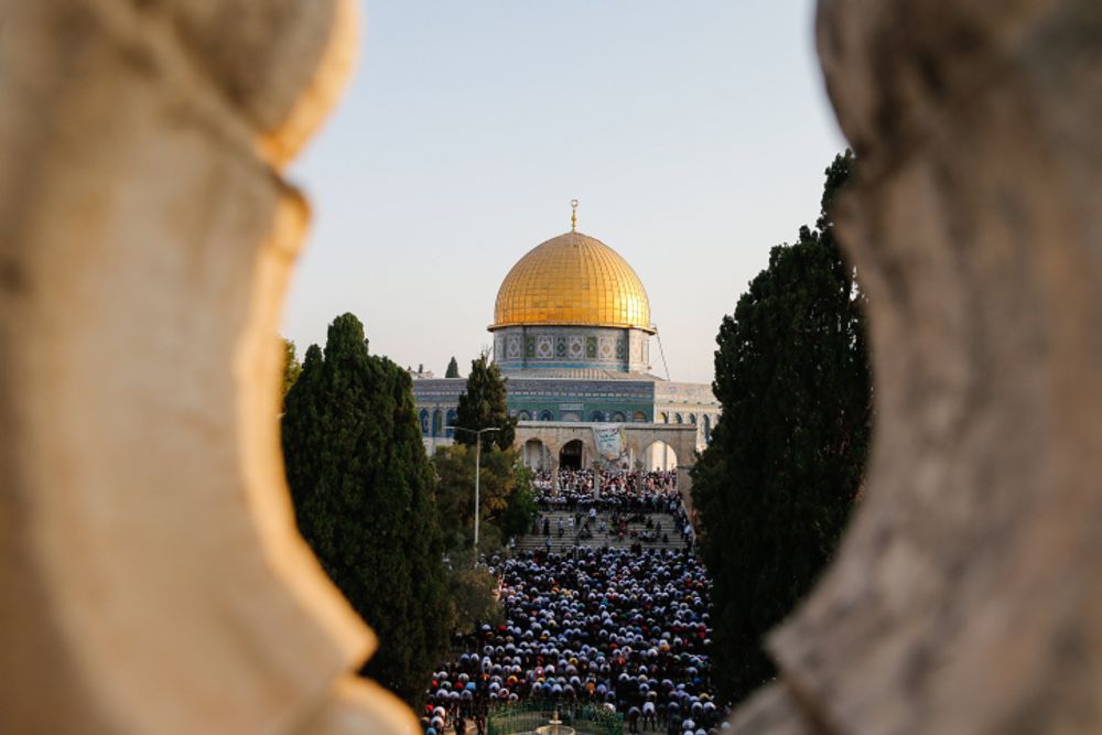Thousands of Palestinians attend Eid prayers at the Al Aqsa Mosque (Dome of the Rock) in Jerusalem's Old City, July 20, 2021.
