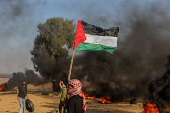Palestinians clash with Israeli forces near the border separating between Israel and the Gaza Strip, on September 22, 2023.
