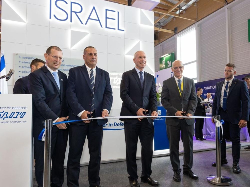 Israel's Defense Minister Yoav Gallant (C) inaugurates the country's national pavilion at the 2023 Paris Air Show in France.