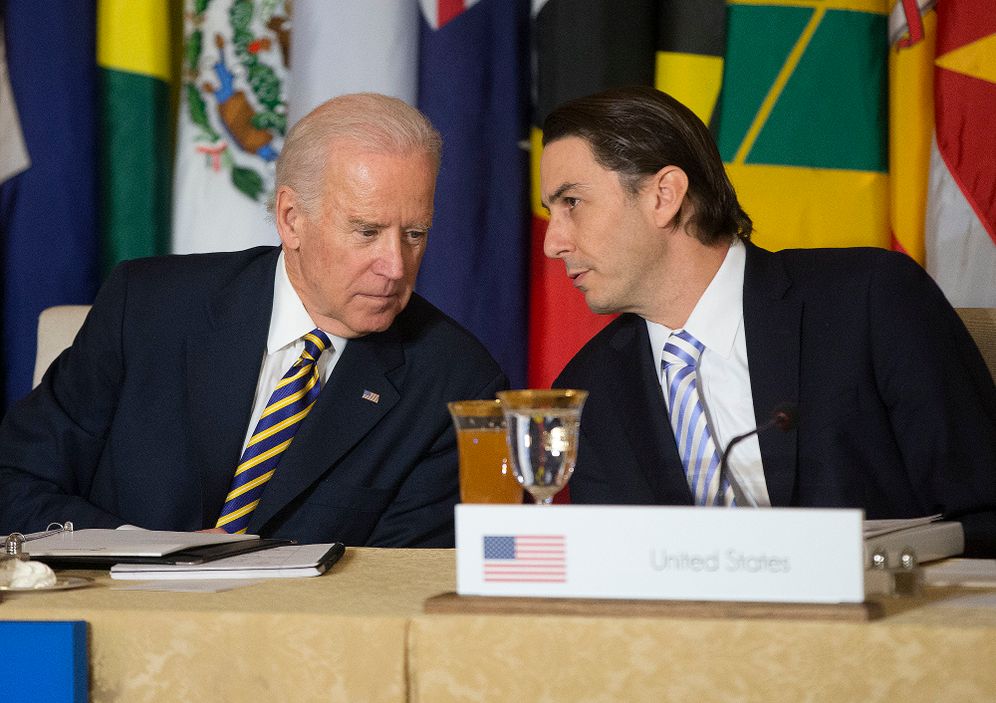 Then-Vice President Joe Biden, left, talks with then-State Department Special Envoy for International Energy Affairs Amos Hochstein at the State Department in Washington, January 26, 2015.
