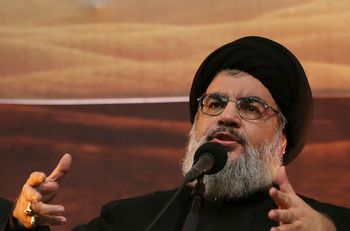 FILE - Hezbollah leader Hassan Nasrallah addresses supporters ahead of the Shiite Ashura commemorations, in the southern suburb of Beirut, Lebanon, on Nov. 3, 2014