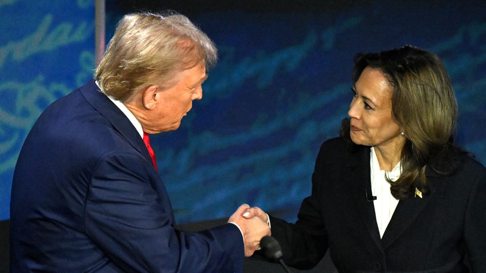 US Vice President Kamala Harris and former president Donald Trump shake hands during the presidential debate