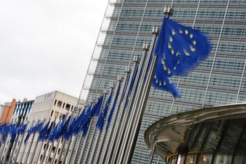 European Union flags flap in the wind outside EU headquarters in Brussels, Tuesday, May 12, 2026