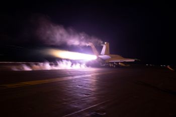 An aircraft launching from USS Dwight D. Eisenhower during flight operations in the Red Sea