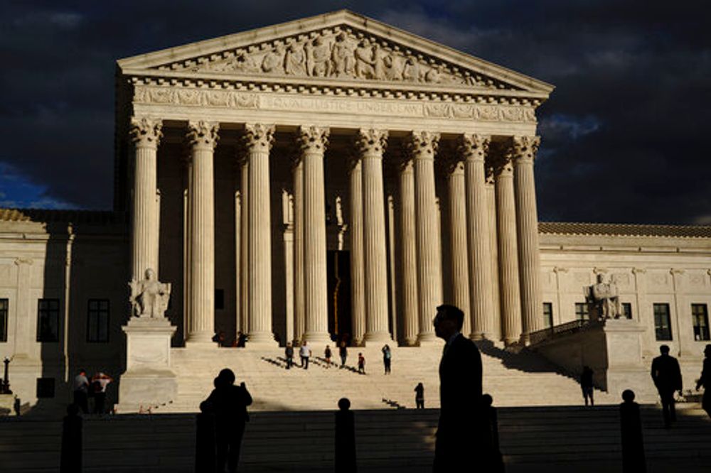 The U.S Supreme Court building is seen at dusk in Washington, October 22, 2021.