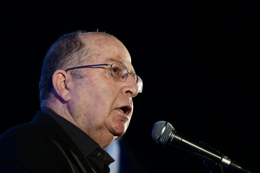 FILE - Israeli lawmaker Moshe Yaalon speaks during a protest against Prime Minister Benjamin Netanyahu calling for his resignation, at Rabin Square in Tel Aviv, on April 19, 2020.