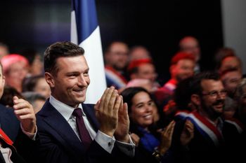 FILE - French far-right Jordan Bardella applauds the speech of Marine Le Pen, on Sept.13, 2026 in Henin-Beaumont, northern France. 
