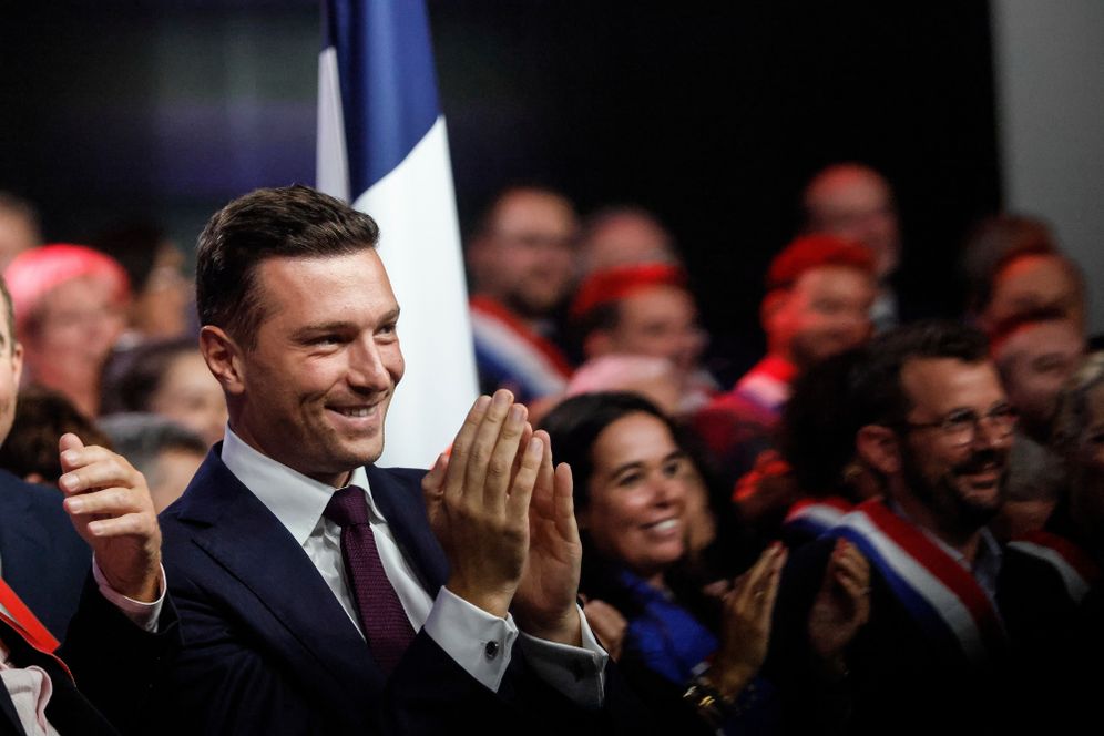 (AP Photo/Jean-Francois Badias, File) FILE - French far-right Jordan Bardella applauds the speech of Marine Le Pen, on Sept.13, 2026 in Henin-Beaumont, northern France.