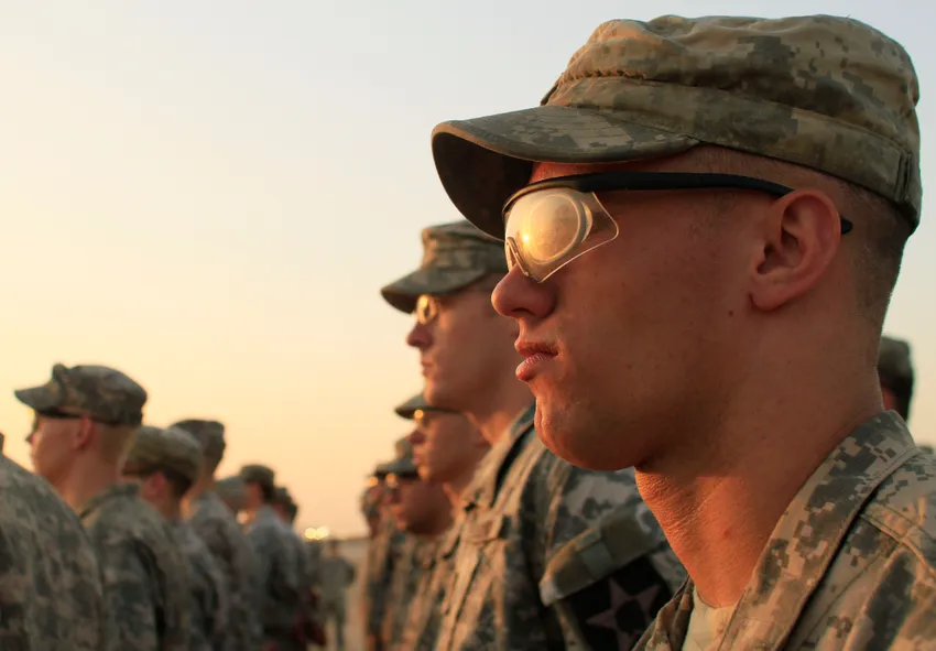 In this photo taken Saturday, Aug. 21, 2010, U.S. Army soldiers from 4th Battalion, 9th Infantry Regiment stand in formation during the casing ceremony for 4th Brigade, 2nd Infantry Division